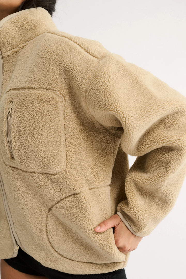 flo sherpa jacket in beige by primi apparel