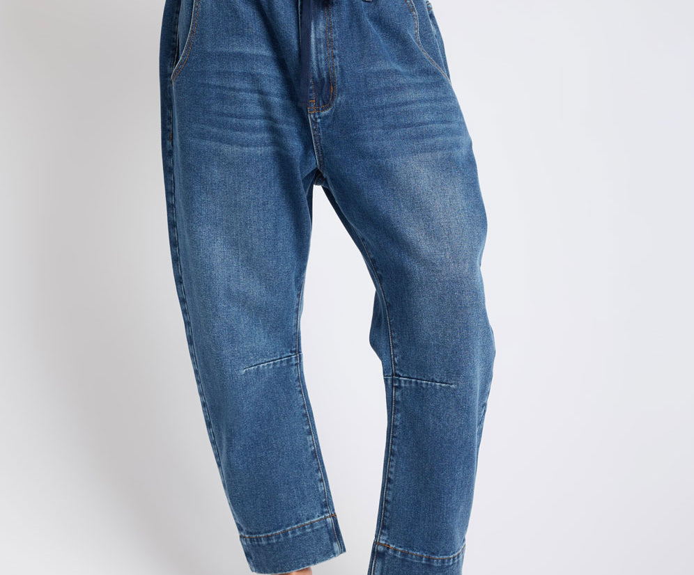 Outcast Drop Crotch Harem Denim Jeans on a white background