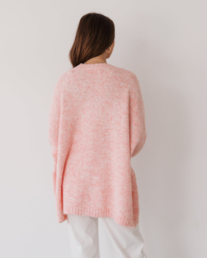 back detail label of love oversize sweater in pink
