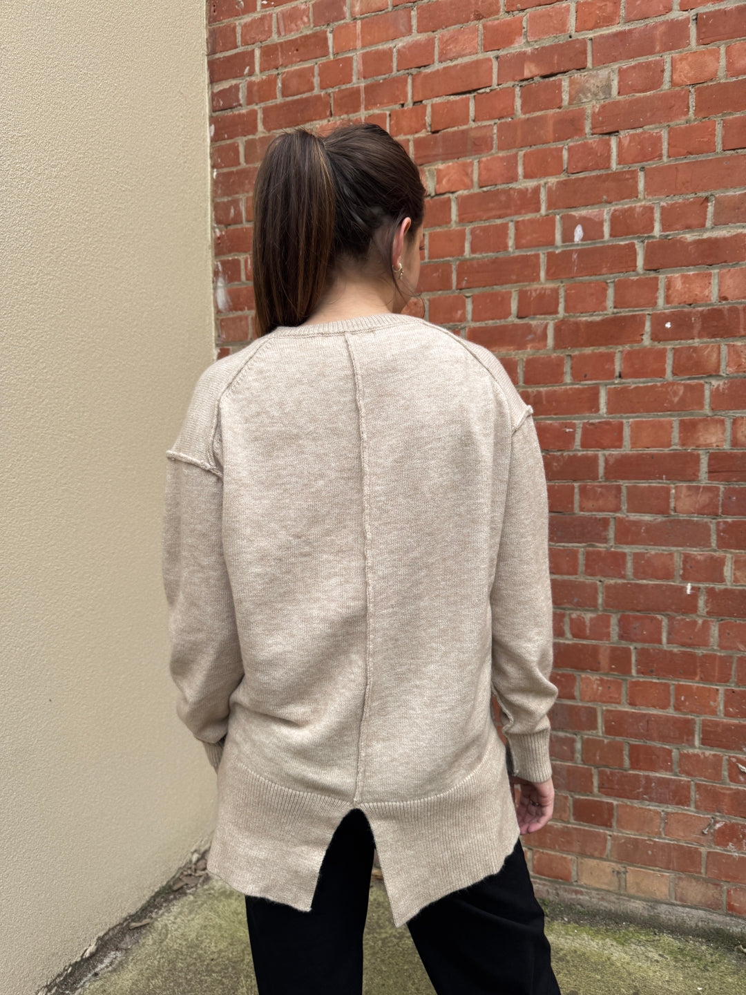 Stella wearing the Sunny Girl caprice knit jumper